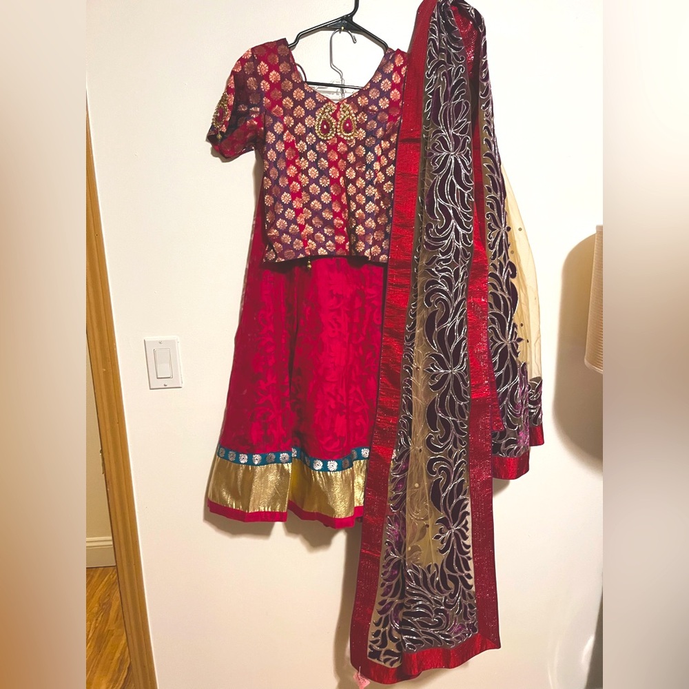 Elegant pink and Gold Kids lengha choli features intricate